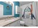 Bathroom showcasing a modern vanity and fun, aquatic-themed decor around the shower at 2214 Pathway Dr, Chapel Hill, NC 27516