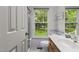 Bright bathroom with window and a shower and tub combination at 2214 Pathway Dr, Chapel Hill, NC 27516