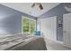 Cozy bedroom features a window with a view and a spacious closet for storage at 2214 Pathway Dr, Chapel Hill, NC 27516