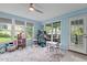 Bright bonus room with large windows, neutral rug, and space for both work and play at 2214 Pathway Dr, Chapel Hill, NC 27516