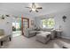 Spacious living room with large sectional sofa and view into another room at 2214 Pathway Dr, Chapel Hill, NC 27516