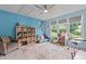 Spacious playroom with shelving, comfortable seating, a desk, and many toys at 2214 Pathway Dr, Chapel Hill, NC 27516