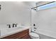 A modern bathroom with dark fixtures, a white countertop, and a shower with a tub at 222 Cherrybirch Ln, Zebulon, NC 27597