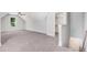 A bonus room featuring plush carpet, a large window, and an open closet space at 222 Cherrybirch Ln, Zebulon, NC 27597