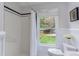 Bright bathroom with white subway tile, wainscoting and a window view at 2222 Pathway Dr, Chapel Hill, NC 27516