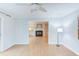 Inviting bonus room with wood floors that leads to the living room and the outdoors at 2222 Pathway Dr, Chapel Hill, NC 27516