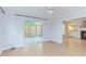 Bonus room with wood floors, ceiling fan, and sliding doors leading to the deck at 2222 Pathway Dr, Chapel Hill, NC 27516
