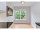 Cozy breakfast nook with a view of the yard through the bright window at 2222 Pathway Dr, Chapel Hill, NC 27516