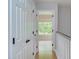 Hallway view into a room with lots of natural light at 2222 Pathway Dr, Chapel Hill, NC 27516