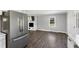 View of the updated kitchen flowing into the living room, creating an inviting living space at 224 Grameta Ln, Lillington, NC 27546