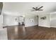 Spacious open floor plan of living room with wood flooring leading to kitchen and backyard at 224 Grameta Ln, Lillington, NC 27546