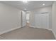 Spacious bedroom featuring neutral colors, carpeted floors, and closet storage at 228 Cloverdale Rd, Apex, NC 27523