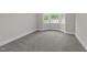 Cozy bedroom bathed in natural light from bay windows and neutral carpeting at 228 Cloverdale Rd, Apex, NC 27523