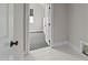 Hallway leading to bedroom with decorative carpet and white painted trim at 228 Cloverdale Rd, Apex, NC 27523