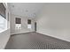Spacious living room showcasing neutral walls, carpet, and recessed lighting at 228 Cloverdale Rd, Apex, NC 27523