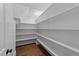 Walk-in pantry with ample shelving for storage at 228 Cloverdale Rd, Apex, NC 27523