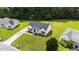 Aerial view of a home on a well-manicured lawn in a quiet neighborhood at 236 Katie Dr, Rocky Mount, NC 27803