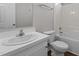 Bathroom showcasing a vanity, toilet and tub-shower combo at 236 Katie Dr, Rocky Mount, NC 27803