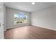 Comfortable bedroom with hardwood floors and natural light coming through the window at 236 Katie Dr, Rocky Mount, NC 27803