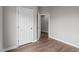 Bedroom showcasing an open door and wood-look flooring at 236 Katie Dr, Rocky Mount, NC 27803