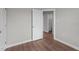 Bedroom showcasing an open door and wood-look flooring at 236 Katie Dr, Rocky Mount, NC 27803