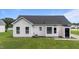 Back exterior view of a well-maintained house with gray roof and vinyl siding at 236 Katie Dr, Rocky Mount, NC 27803