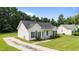 A lovely single-story home features a well-kept lawn and a paved driveway at 236 Katie Dr, Rocky Mount, NC 27803