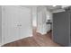 Hallway with a closet and fridge at the kitchen area, showcasing the home's layout at 236 Katie Dr, Rocky Mount, NC 27803
