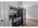 Modern kitchen featuring stainless steel appliances and well-maintained cabinetry at 236 Katie Dr, Rocky Mount, NC 27803