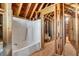Bathroom framing with a bathtub and shower combo in an unfinished space at 240 Carrington Ave, Franklinton, NC 27525