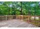 The spacious wooden deck has ample space for entertaining at 240 Carrington Ave, Franklinton, NC 27525