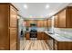 Well-equipped kitchen with stainless steel appliances, ample cabinet space, and modern finishes at 240 Carrington Ave, Franklinton, NC 27525