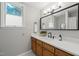 Updated bathroom featuring a modern vanity, sleek fixtures, and stylish tile flooring at 2504 W Club Blvd, Durham, NC 27705
