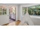 Bonus room featuring a door to the porch and a tent beside the window at 2504 W Club Blvd, Durham, NC 27705