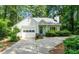 Well-maintained single-Gathering home with a garage and landscaped front yard at 2504 W Club Blvd, Durham, NC 27705