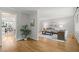 Cozy living room with hardwood floors and a view into the dining area at 2504 W Club Blvd, Durham, NC 27705