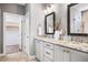 Bright bathroom features double vanity, granite countertops, and decorative mirrors at 262 Salt Cedar Ln, Chapel Hill, NC 27516