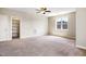 Bedroom features carpeted floors, a closet, and a window for natural light at 262 Salt Cedar Ln, Chapel Hill, NC 27516