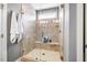 Walk-in shower features tile surround, glass door, and bench at 262 Salt Cedar Ln, Chapel Hill, NC 27516