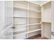 Spacious walk-in closet features custom shelving and ample storage space for an organized wardrobe at 262 Salt Cedar Ln, Chapel Hill, NC 27516