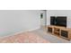 Bedroom featuring carpet, a wooden media center, TV, and natural light at 2806 High Plains Dr, Fuquay Varina, NC 27526