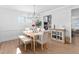 Elegant dining room features a wooden table, upholstered chairs, and decorative chandelier at 2806 High Plains Dr, Fuquay Varina, NC 27526