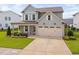 Beautiful two-story home featuring a two-car garage, inviting porch, and well-maintained landscaping at 2806 High Plains Dr, Fuquay Varina, NC 27526