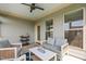 Inviting screened porch with comfortable seating, a ceiling fan, and neighborhood views at 2806 High Plains Dr, Fuquay Varina, NC 27526