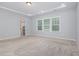 Primary bedroom features carpet floors, recessed lighting and a window with backyard views at 2914 Farmhouse Dr, Apex, NC 27502