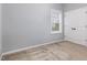 Bedroom featuring a window and closet, with gray walls and neutral carpeting at 2914 Farmhouse Dr, Apex, NC 27502