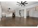 Spacious living room showcases hardwood floors connecting kitchen and staircase at 2914 Farmhouse Dr, Apex, NC 27502
