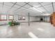 Bright basement with windows, concrete floors, and support beams for a clean, functional space at 3129 Tarheel Clubhouse Road Rd, Raleigh, NC 27604