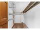 Walk in closet with wire rack shelving and carpet flooring at 3129 Tarheel Clubhouse Road Rd, Raleigh, NC 27604