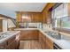 Kitchen features an island cooktop and plenty of counter space for food preparation at 3129 Tarheel Clubhouse Road Rd, Raleigh, NC 27604